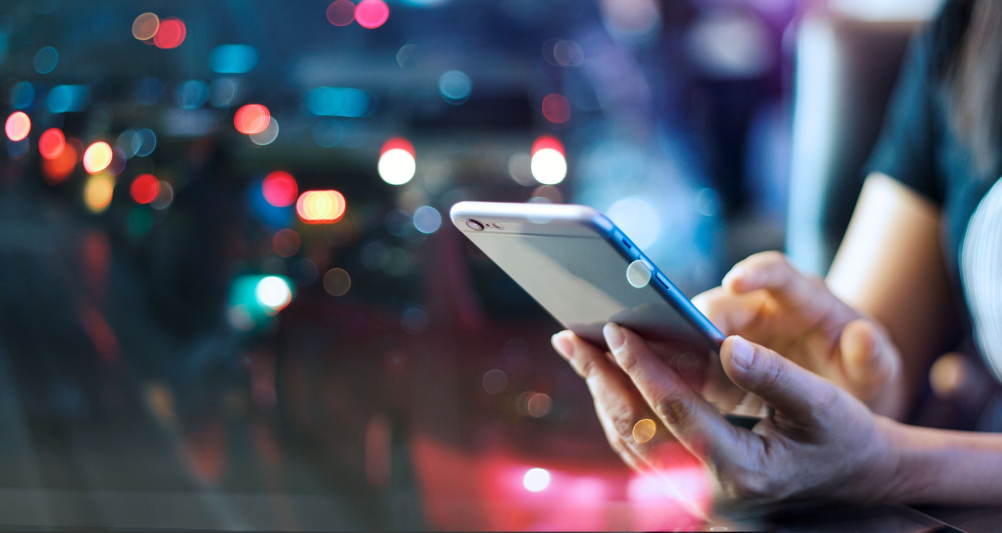 Small business team using smartphones on $15 business phone plan from Premier Wireless