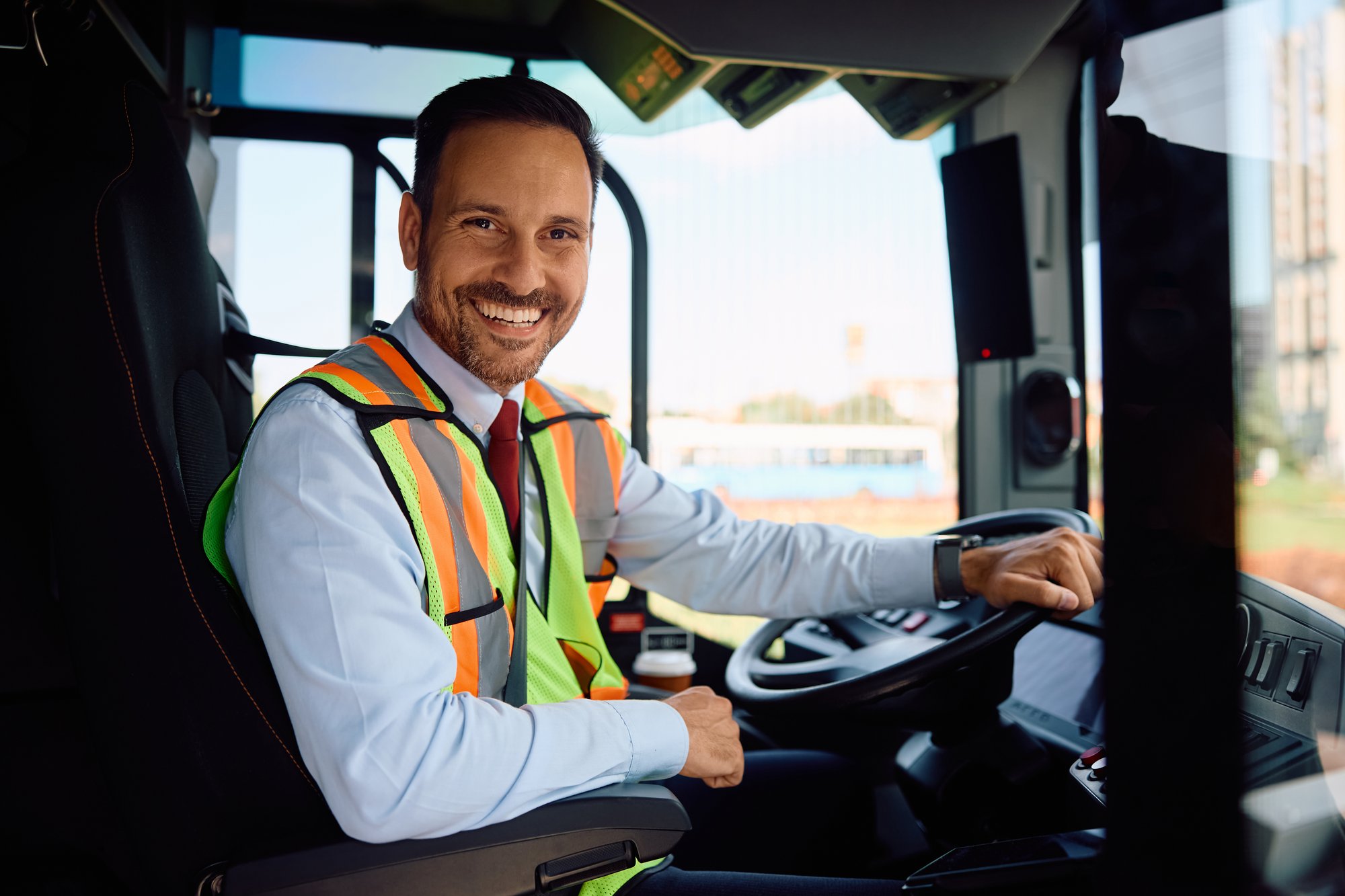 School transportation dispatch team monitoring connected bus systems